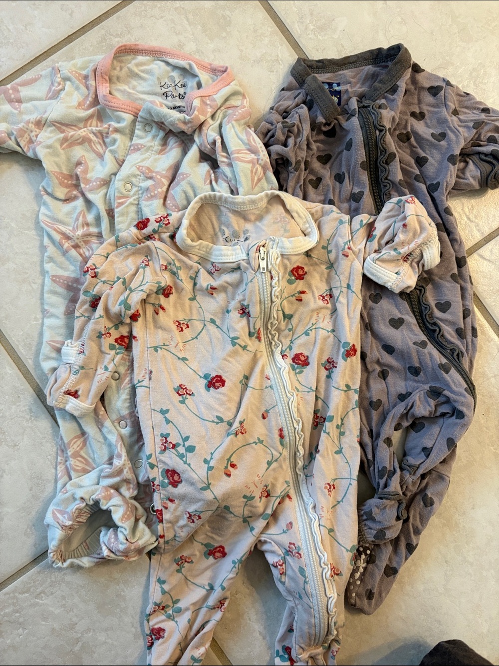 Kickee Pants. Four zip footies and one that can be snapped into a gown or legs